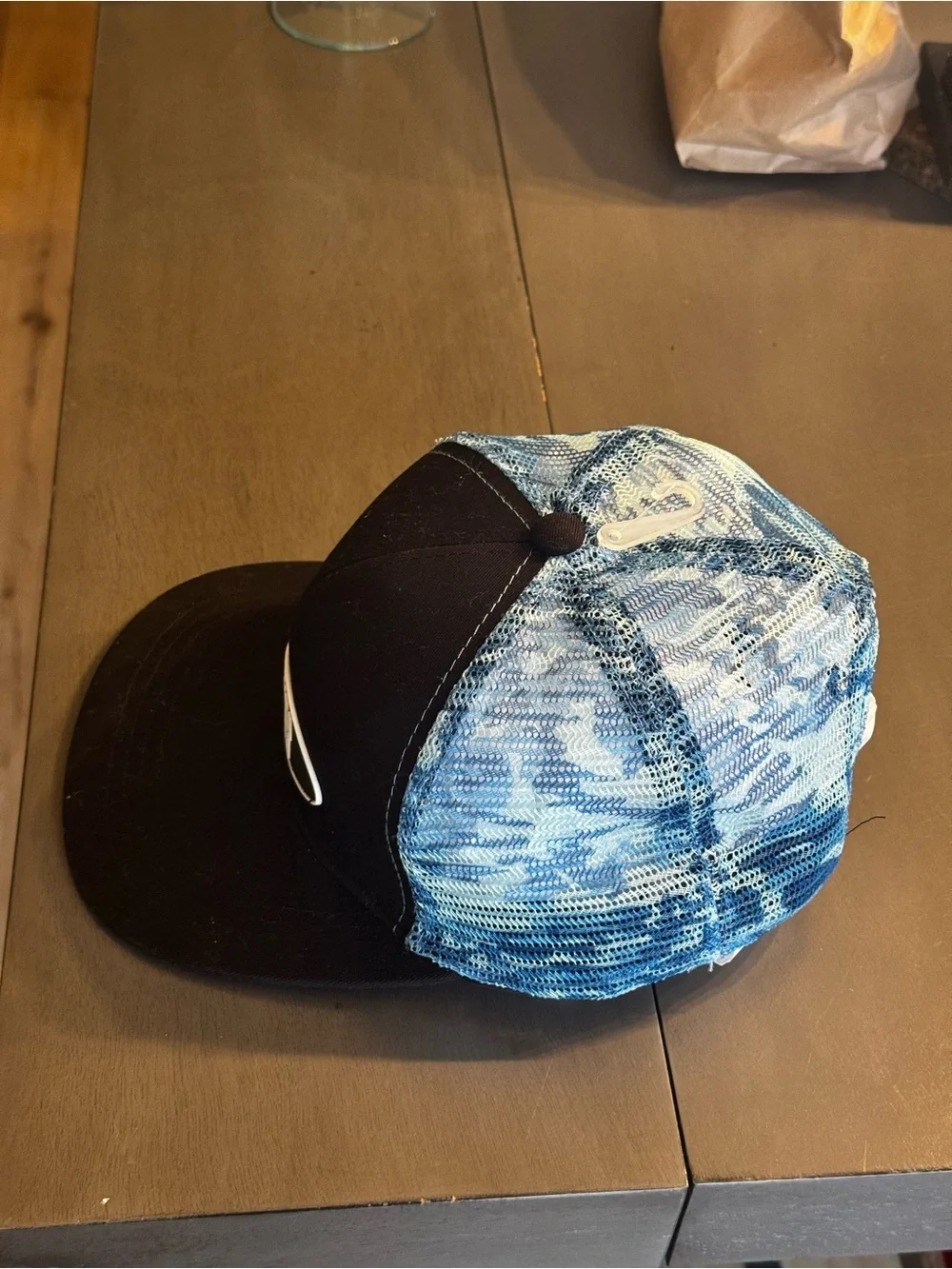 NWOT Pura Vida black & blue trucker hat, blue tie-dye mesh, adjustable band.